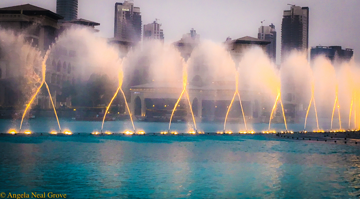 Dateline Dubai, What's New The world's largest choreographed fountain dances, bobs and weaves to music below the 2,716.5 foot Burj Khalifa//Photo: A.N.Grove