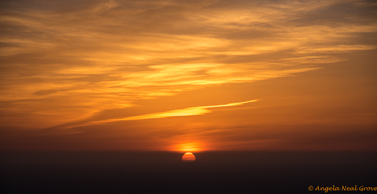 Big Sur Spring Recovery Update; Sunset over Pacific Ocean from Big Sur after a winter of devastating floods and mudslides://Photo: Angela Neal Grove