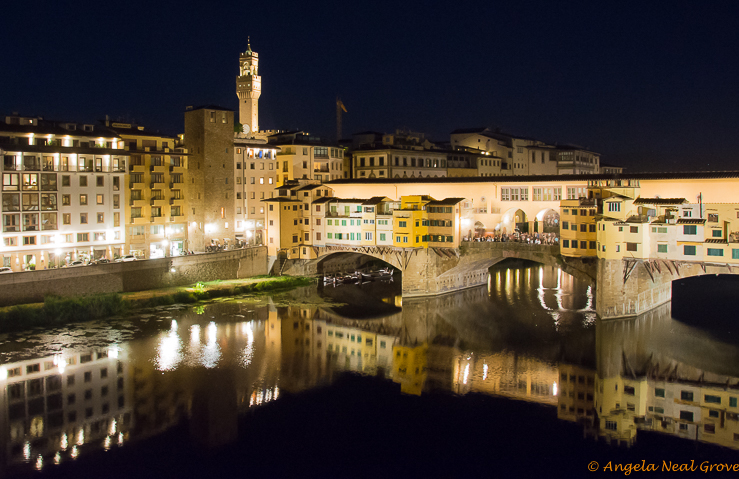 Florence Highlights and Tuscan Tales: The Ponte Vecchio bridge over the River Arno at night