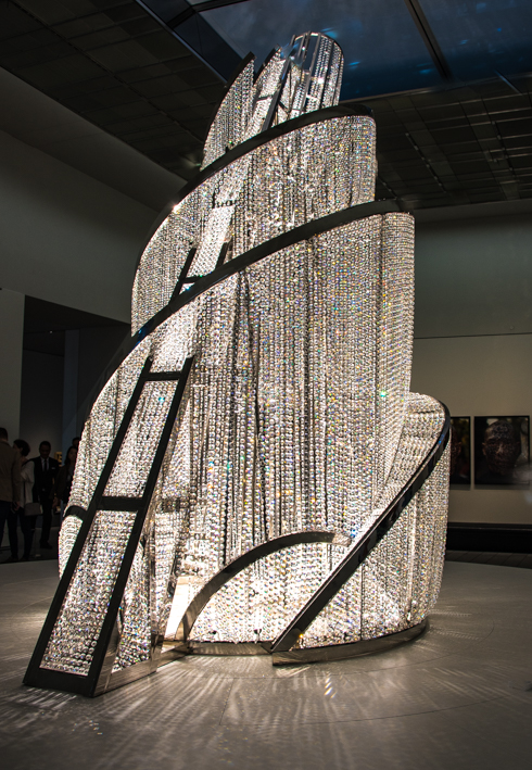 Louvre Abu Dahbi Breaks Boundaries Bridges Civilizations: stunning Fountain of light by Chinese artist Ai Weiwei is reminiscent of the tower of Babel. It was commissioned by the Museum.