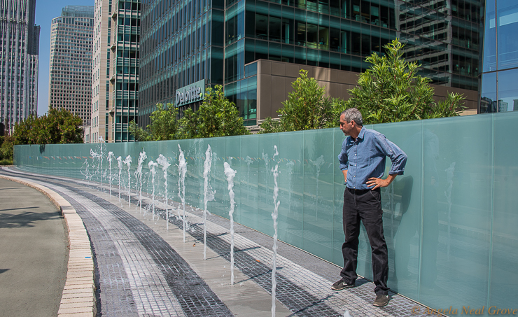 Sebastopol based artist Ned Kahn at his Bus Jet Fountain at the Salesforce Transit Center. His feels strongly art is all about fostering connections. Here children will enjoy the water, the art reinforces the architecture and it is appropriate in a part of the city which used to be a marsh. (Image: /A.N.Grove)