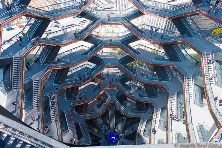 Manhattan Walking New Highlights:Looking down into the center of The Vessel. It looked like a gigantic honeycomb seen from a bird soaring over the Hudson. The small blue dot in the center was selfie central!  //PHOTO; ANGROVE