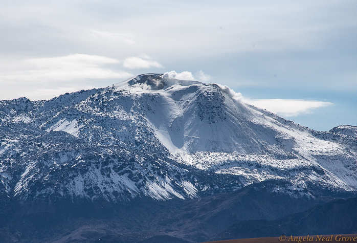 Otherworldly Atacama Desert. Active Lascar volcano. Steam can be seen rising from the crater. Lascar is another popular climb. It is not usually snow clad.  PHOTO: AN GROVE