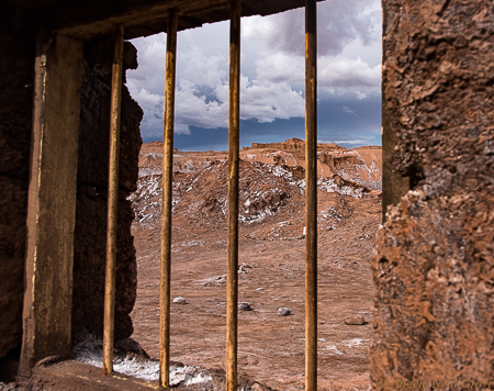 Otherworldly Atacama Desert. Looking out through the window of a deserted mining ghost camp near the Valley of Mars. PHOTO; AN GROVE