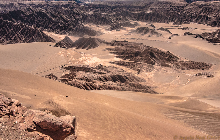 Otherworldly Atacama Desert. Valley of the Moon near San Pedro de Atacama. This luna landscape has wavelike ridges of rock which have been sculpted into peaks by sand and wind.  PHOTO; ANGROVE