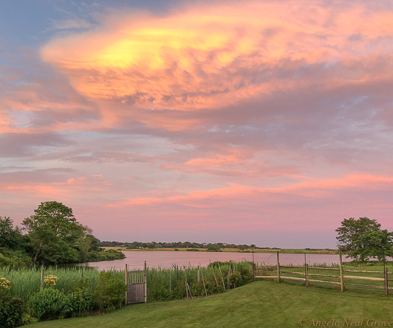 Sunset over Hook Pond, East Hampton. Here hundreds of fireflies light up lawns, dance, glow, then vanish. East Hampton, Long Island, is know for its beautiful sunsets. //PHOTO//ANGROVE