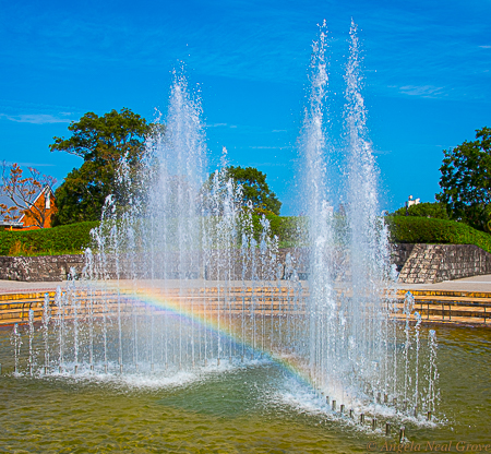 Rainbow reflected in the fountains in the Nagasaki Peace Park.  The fountains were designed to represent the wings of a dove.  PHOTO; ANGROVE