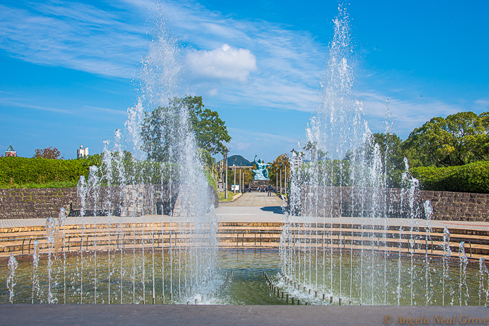 The Nagasaki Peace Park is adjacent to the Bomb Museum. There is sculpture given by nations across the world to promote peace.  Above is the central fountain shaped like wings of a dove. In the distance is the peace statue created by Japanese sculptor, Seibo Kitamura. PHOTO; ANGROVE