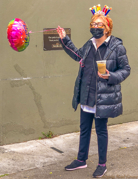 Celebrating a birthday, socially distanced outside Peets coffee shop. We could not hug, we could not gather or visit, but somehow we found a way to have fun amid the gathering gloom. PHOTO;//ANGROVE