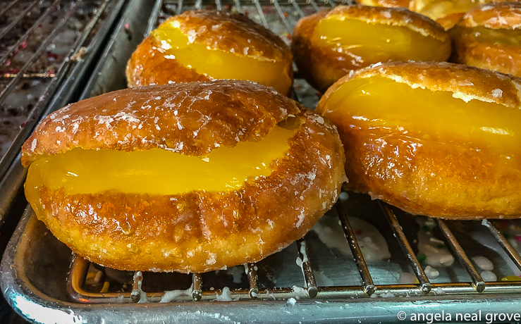 From the Doughnut man in Grand Central Market, these gleaming sugar-frosted lemon-filled doughnuts are mouthwatering and delicious! "Handmade everyday since 1972" some oozed with fresh strawberries or peaches. Others were PB&J filled!
 // PHOTO: ANGROVE