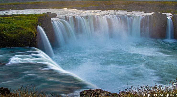 Godafoss Waterfall is one of the most iconic in Iceland - in a land of waterfalls.  Here, this horseshoe fall glitters in the evening light.  Iceland is a land of contrasts. //: PHOTO: A.N GROVE