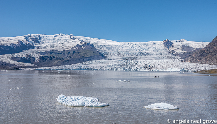 Iceland's vast Vatnajokull ice cap, the third largest in the world. The glacier was "calving" chunks of ice were falling from the face creating icebergs which float in Fjallsarlon, a glacial lagoon, and then make their way out to sea.  Iceland is a land of contrasts. //: PHOTO: A.N GROVE