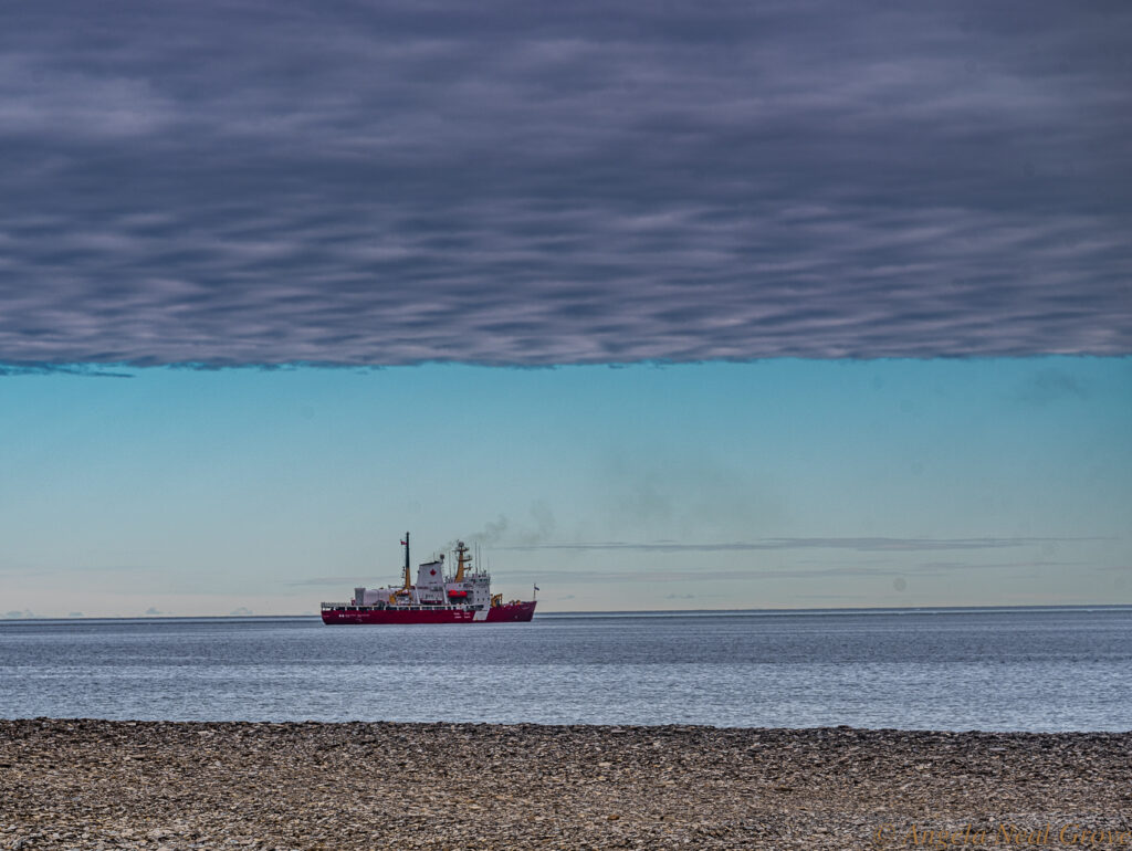 Northwest Passage Arctic Adventure:  It was comforting to know that a Canadian Coastguard ship was in the vicinity when a huge storm was forecast and approaching. We were sailing near Devon Island.  //PHOTO; ANGROVE