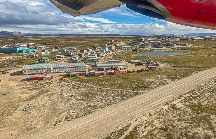 Northwest Passage Arctic Adventure: Pond Inlet, Baffin Island and the gravel runway used by our prop plane.  Pond Inlet is a small predominately Inuit community of 1,300. It has one of Canada's most inhospitable climates.  Our gateway to the Northwest Passage, Pond Inlet is one of just four hamlets in the Canadian Arctic. //PHOTO; ANGROVE