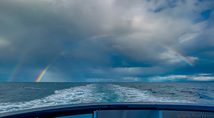 Northwest Passage Arctic Adventure: Leaving Pond Inlet, Baffin Island, heading north across Lancaster Sound to Devon Island in a storm, with rainbow.  //PHOTO; ANGROVE