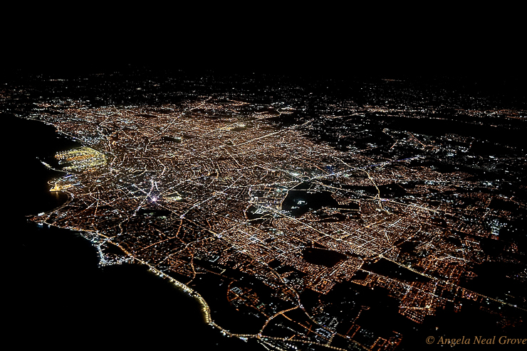 View of Casablanca from the air at night.  On the edge of the Atlantic, the lights of the city look like a gigantic spiders web. PHOTO: //ANGROVE