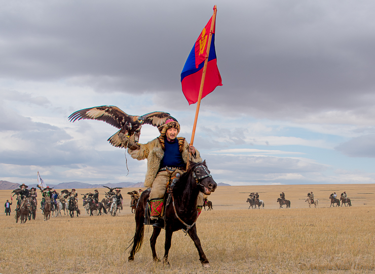 A Khazak eagle hunter with his bird astride his horse at an Eagle Festival in Western Mongolia. Eagle hunting is a century old tradition in the area.
//Photo: ANGrove