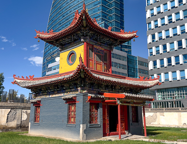 UlaanBator,  capital of Mongolia is changing fast.  Here, the Buddhist Chongjin Lama Temple, which is now a museum, is surrounded and dwarfed by shiny new high-rises.
Photo:// AN Grove