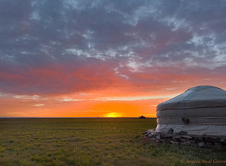 The Gobi Desert, Mongolia, at sunrise seen from the door of my round traditional yurt. The Sky is technicolor meets the horizon in the vast desert.
//Photo: ANGrove