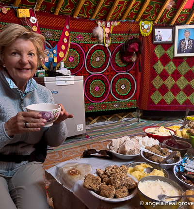 Inside a ger in Mongolia with nomadic herders. Hot milk tea is the traditonal drink offered to all visitors. Soft butter and cream can be added. Served in large bowls for drinking.
Photo:// ANGrove